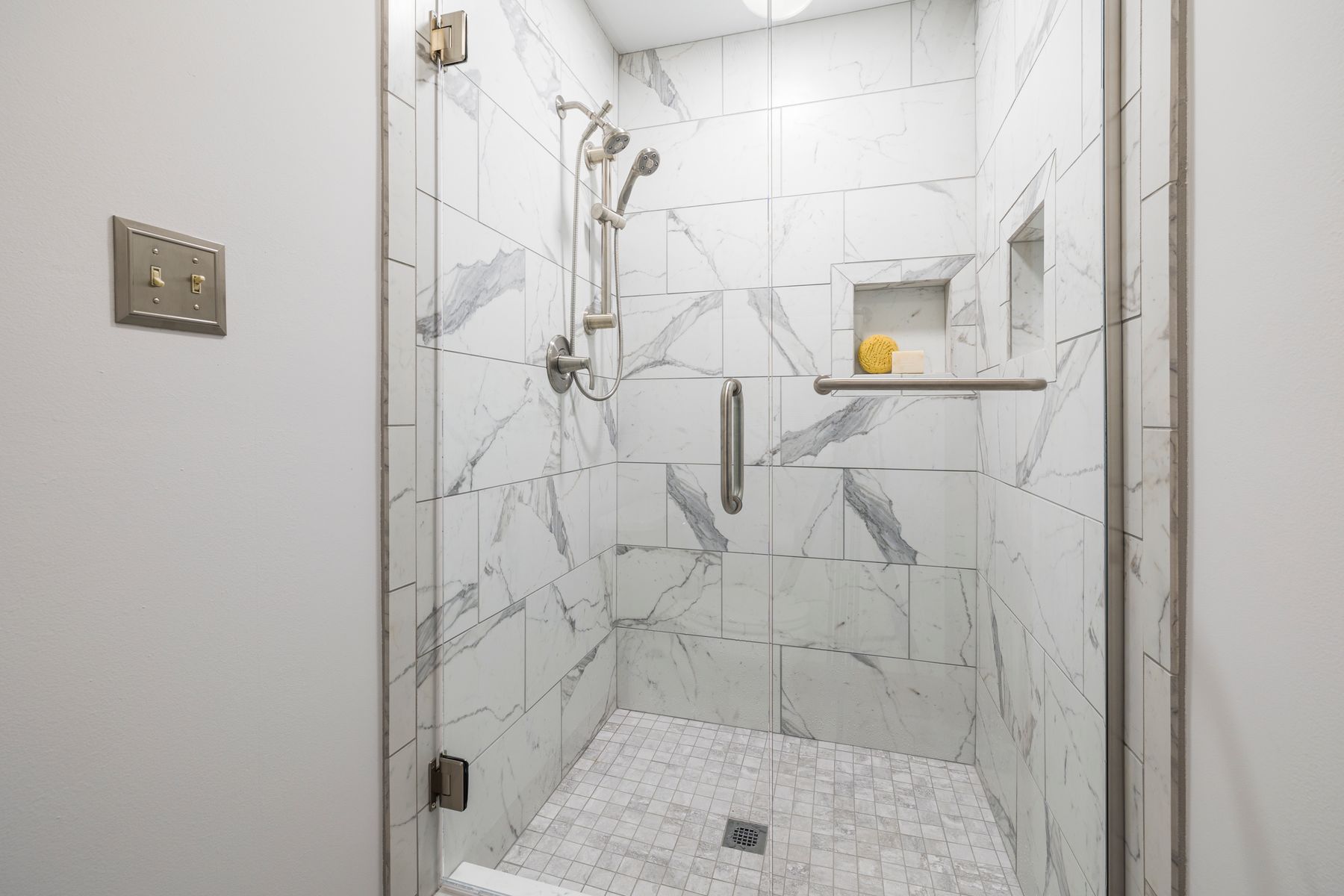 A calm, tiled shower